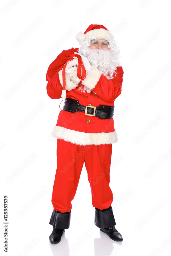 Santa Claus standing with his sack full of presents, isolated on white background. Full length portrait Santa Claus standing with his sack full of presents, isolated on white background. Full length portrait