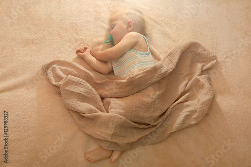 Little baby boy sleeping on...