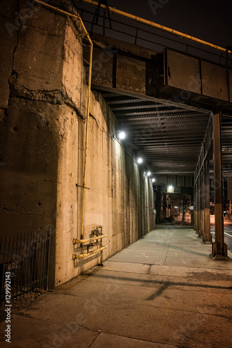 Dark City Train Underpass Sidewalk at Night