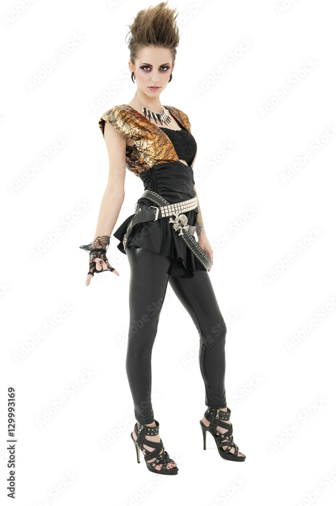 Portrait of punk woman with attitude gesturing rock & roll sign over white background Portrait of punk woman with attitude gesturing rock & roll sign over white background