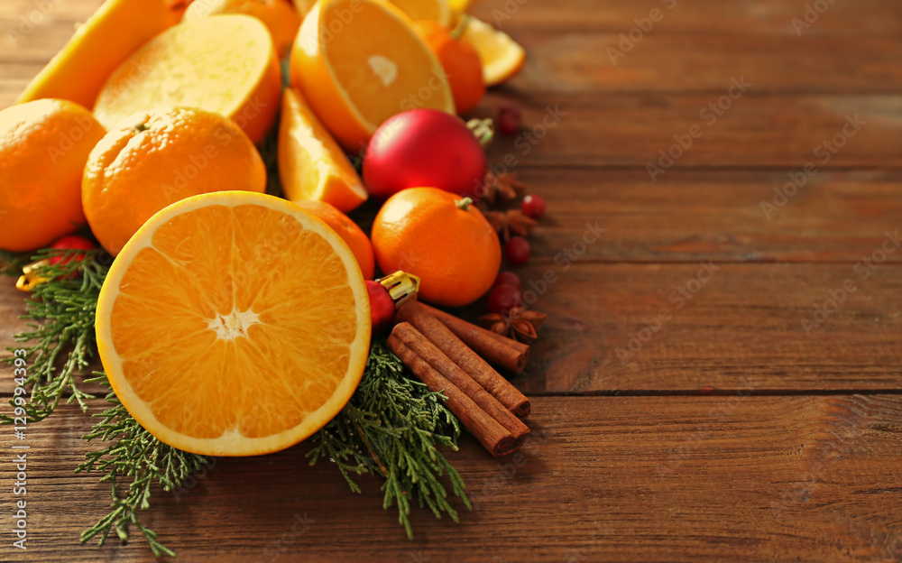Composition of citruses and spices on wooden background, closeup Composition of citruses and spices on wooden background, closeup