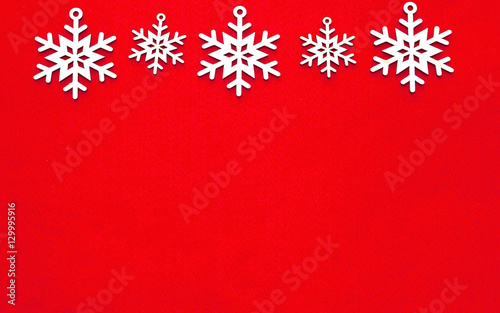 Empty Christmas red Background with wooden seasonal decor as a frame