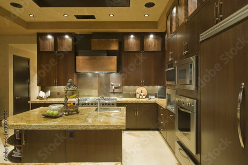 Interior of modern kitchen with cabinets
