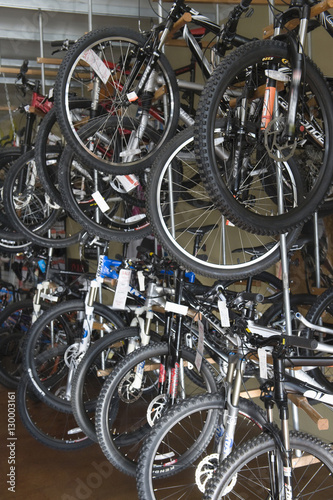 Large group of cycles on display for sale in shop