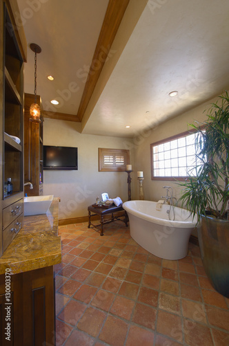 Interior of domestic bathroom with freestanding bathtub