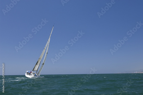 View of a yacht competing in team sailing event