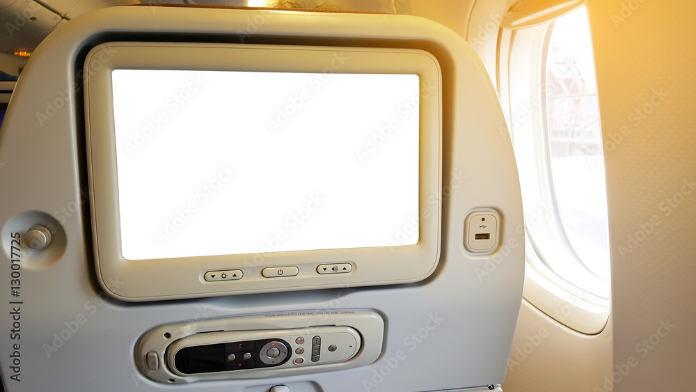 Closeup LCD rear seat on the plane technology for entertainment. Closeup LCD rear seat on the plane technology for entertainment.
