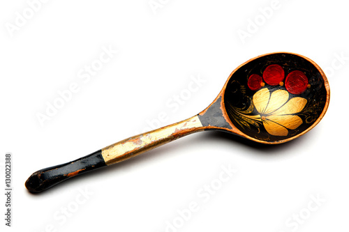 old wooden spoon on white background