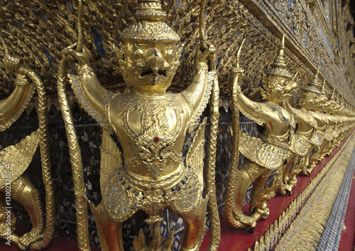 Garudas and nagas on external decorations of the Ubosoth, Wat Phra Kaew temple, Grand Palace, Bangkok photo