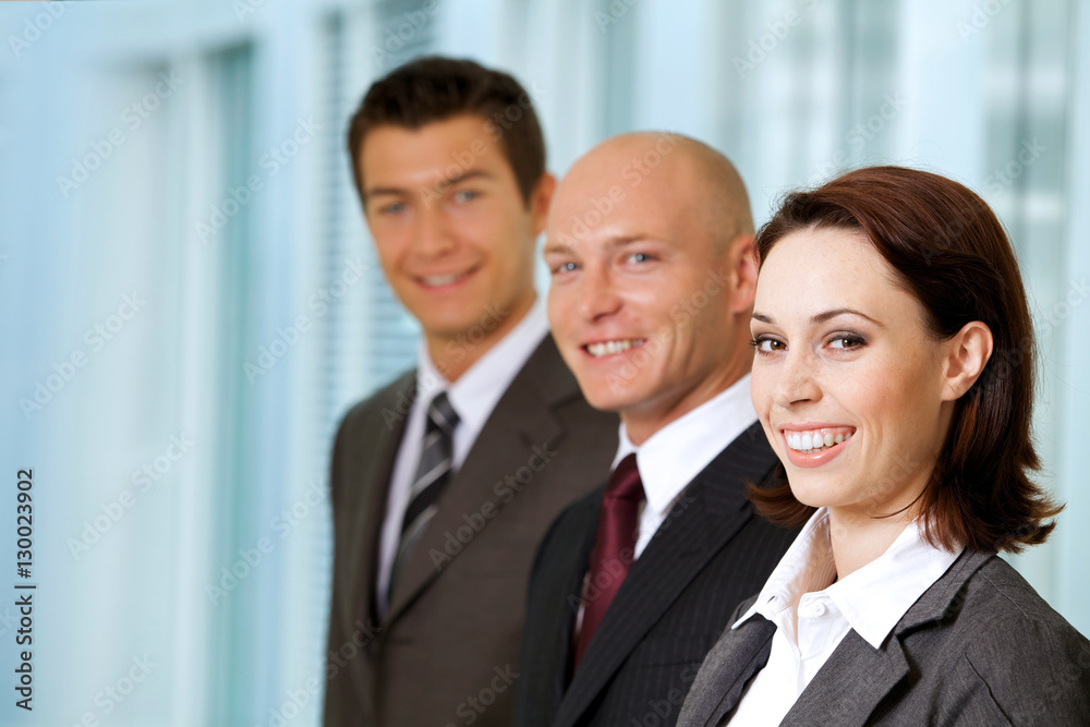 Portrait of young caucasian business people in office Portrait of young caucasian business people in office