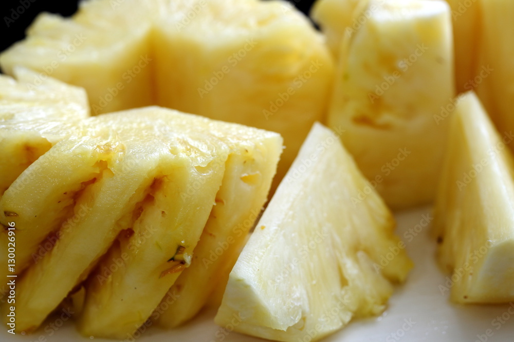 Slices of Ripe Pineapples Close-Up Slices of Ripe Pineapples Close-Up