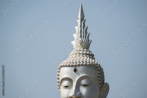 The White buddha status on blue sky background   Thailand