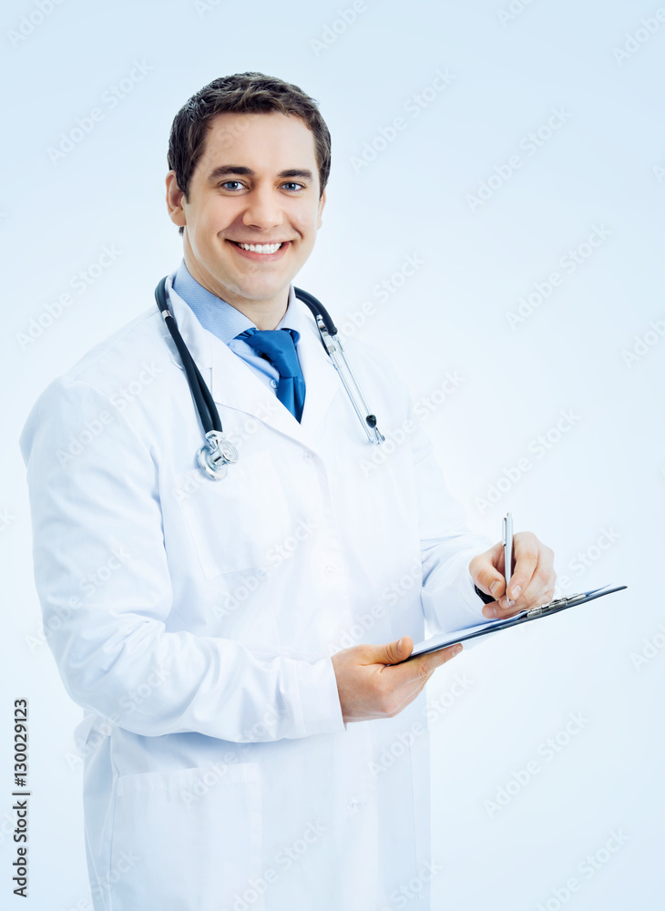 doctor writing on clipboard, on blue doctor writing on clipboard, on blue
