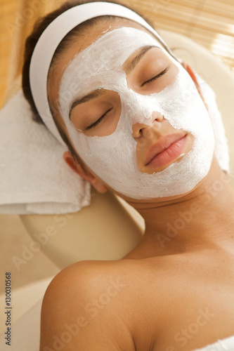 Close-up of young woman wearing facial mask