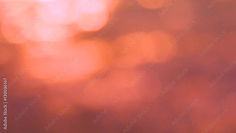 Bokeh blurred water reflecting the sun at sunset Bokeh blurred water reflecting the sun at sunset