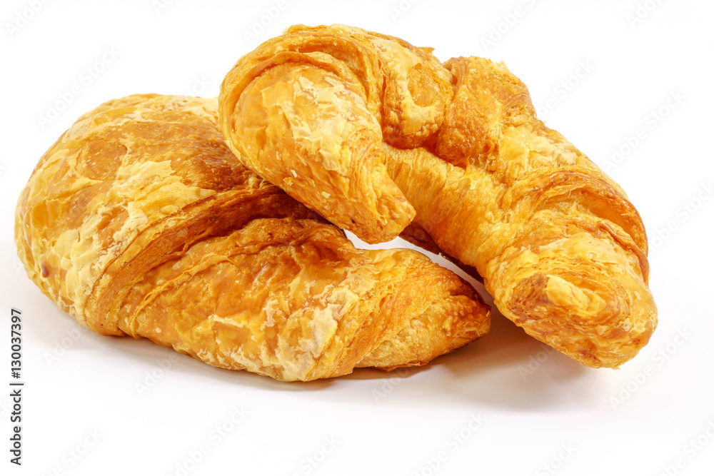 fresh big croissant on white background