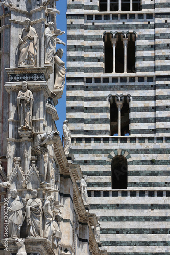 Siena, Tuscany, Italy, towerbell and cathedral details photo