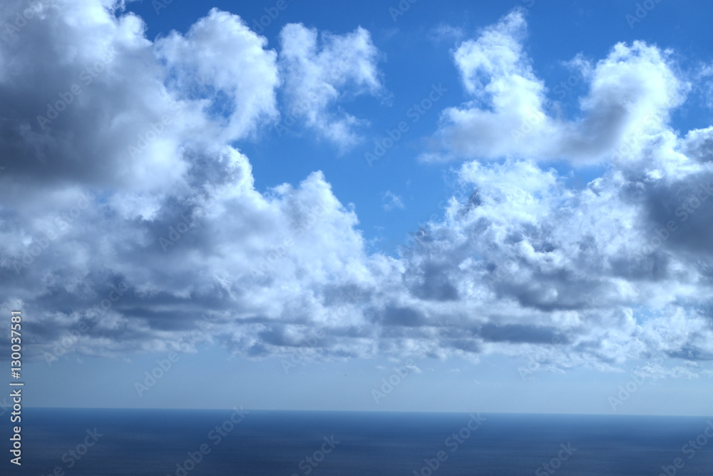 blue sky background with tiny clouds blue sky background with tiny clouds