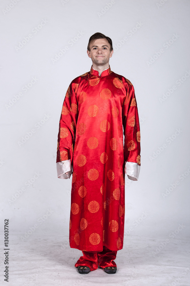 Caucasian male in traditional chinese wedding attire Caucasian male in traditional chinese wedding attire
