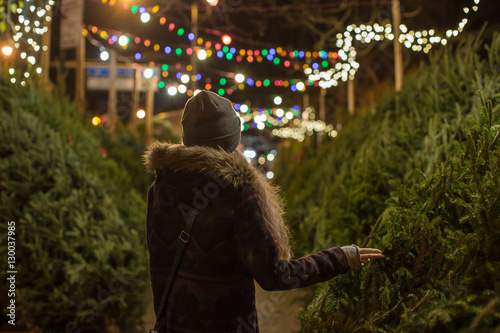 Wallpaper Mural Girl picking christmas tree Torontodigital.ca