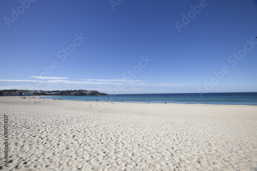 Scenic view of Bondi beach against blue sky, Sydney, Australia
