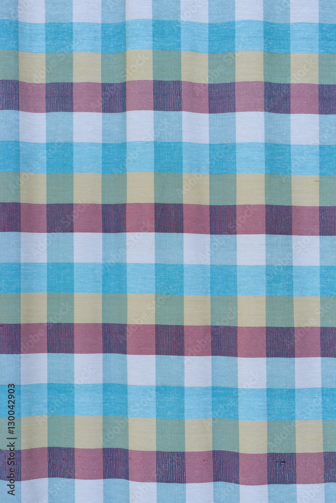 The backdrop made of blue fabric.