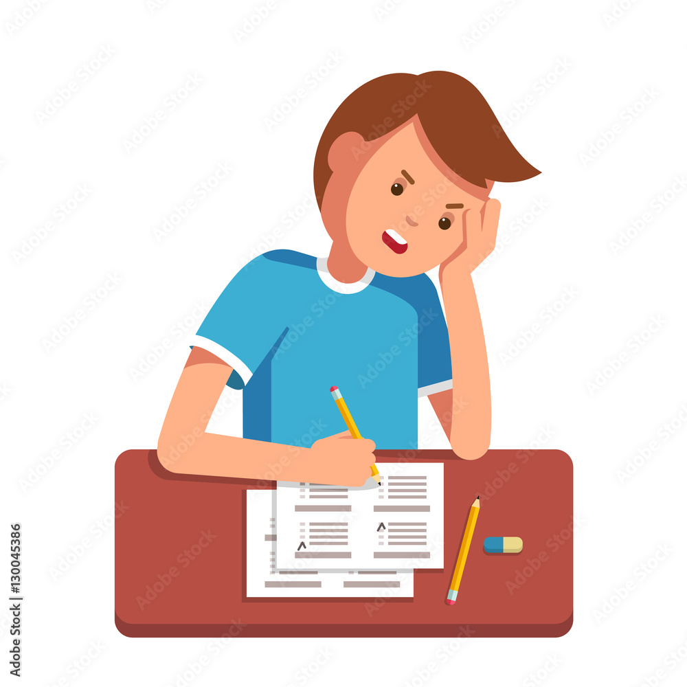 School student filling out answers to exam test School student filling out answers to exam test