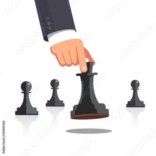 Business man hand making a strategic chess move