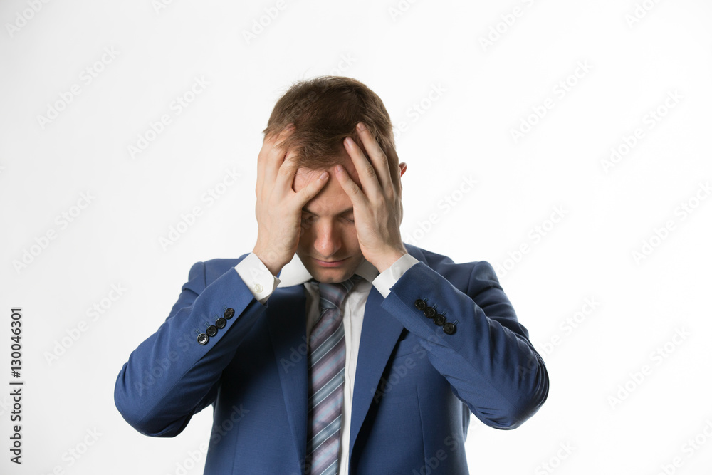 depressed businessman with holding his head in hands depressed businessman with holding his head in hands