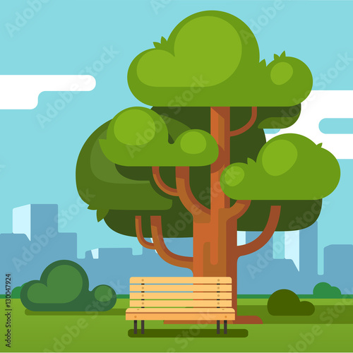 City park bench under an oak with urban landscape