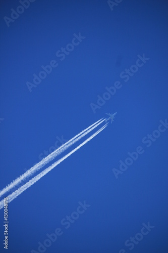 Contrails in a blue sky