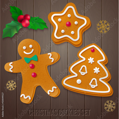 Set of gingerbread Christmas cookies with holly and snowflakes.