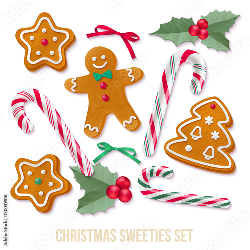Set of gingerbread Christmas cookies with holly and candy canes.