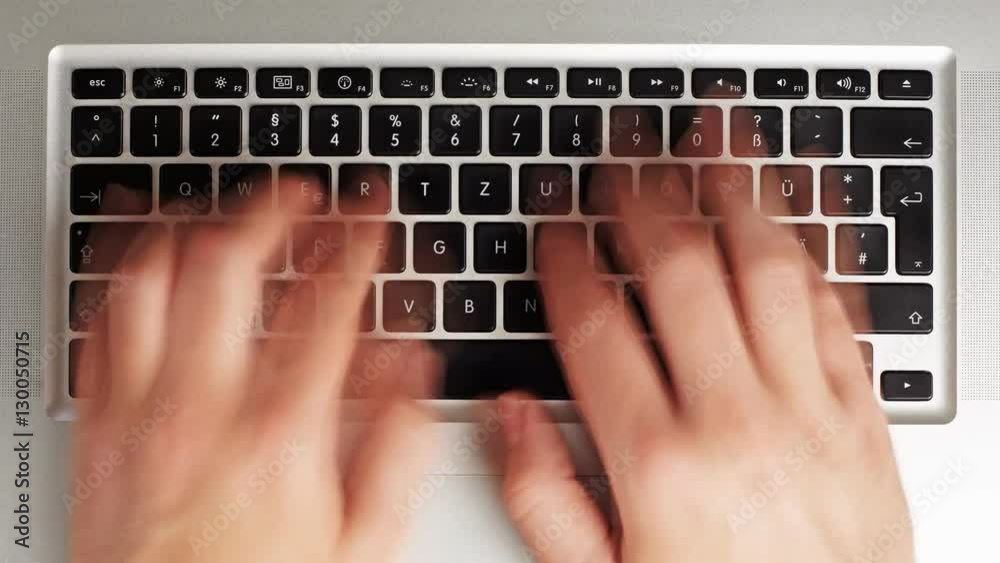 topview time-lapse typing on a computer keyboard