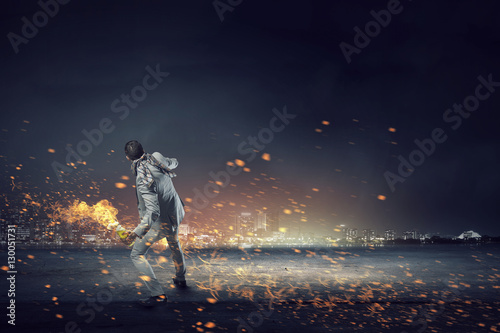 Принти на полотні Businessman throwing petrol bomb . Mixed media