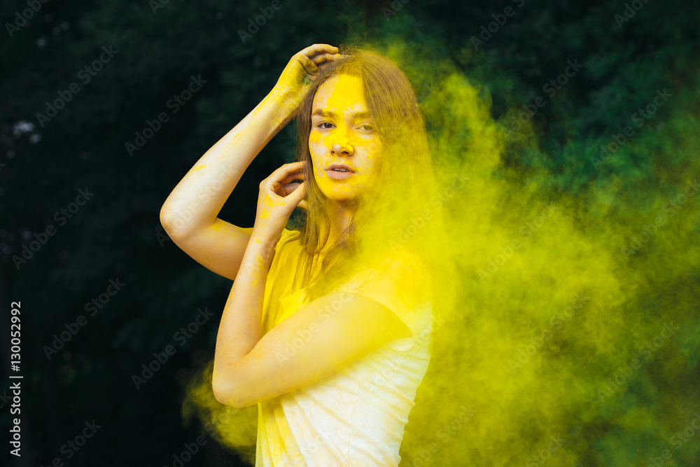 Nice brunette model with powder Holi on her face Nice brunette model with powder Holi on her face