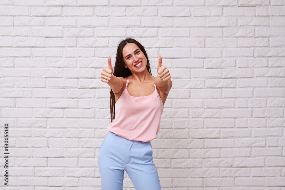 Exhilarating woman inclined head aside while posing at the camer Exhilarating woman inclined head aside while posing at the camer