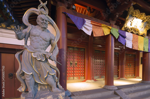 Guardian statue, Buddha Tooth Relic temple, Chinatown, Singapore photo