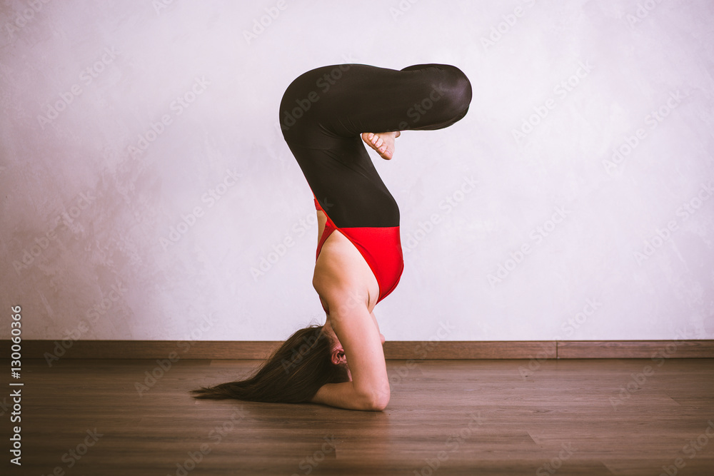 Pretty woman practicing yoga at home Pretty woman practicing yoga at home