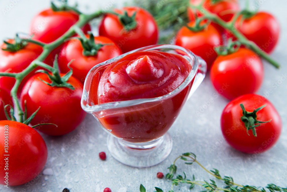 Tomato ketchup sauce with garlic, spices and herbs with cherry t Tomato ketchup sauce with garlic, spices and herbs with cherry t