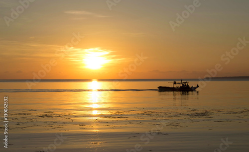 Beautiful orange sunset by seaside travel photo. © Elya.Q