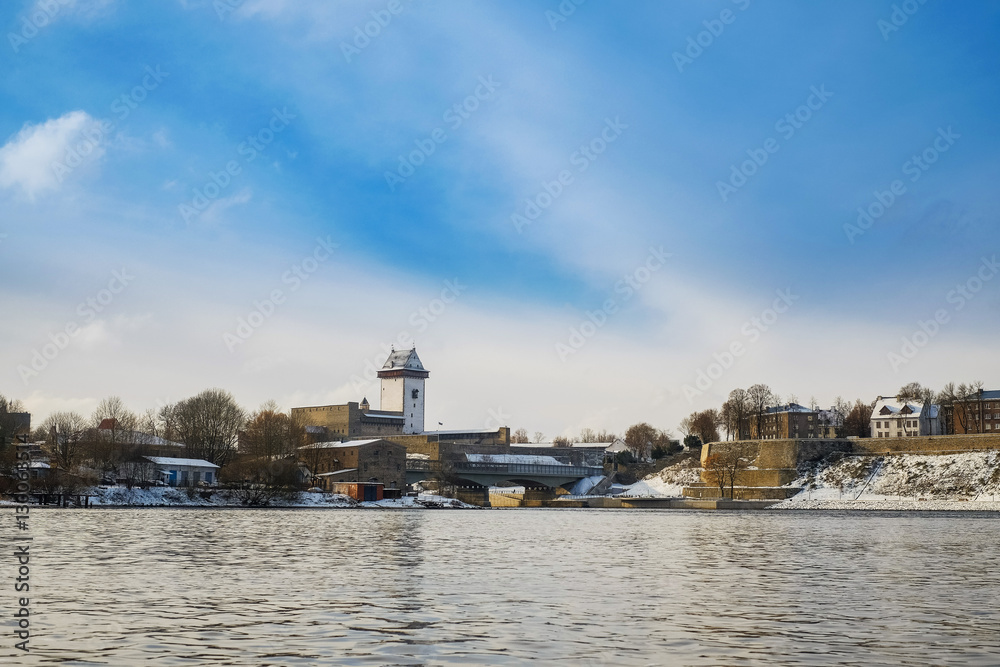 Castle of Herman on the bank of river in winter