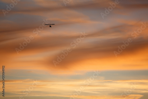 Red sky with hang glider