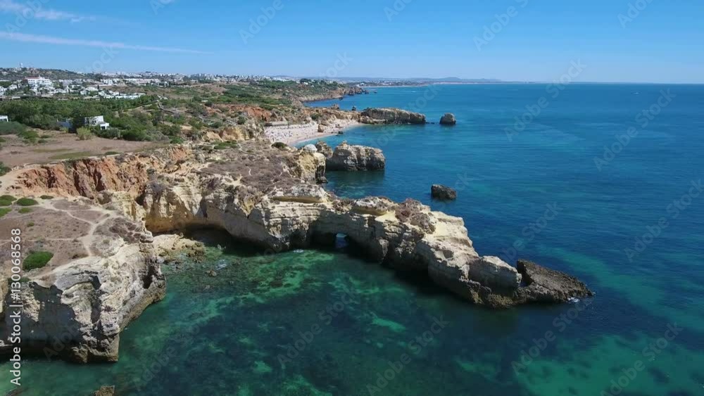 Aerial. Cliffs and beaches of the coast of Albufeira filmed from the sky. Aerial. Cliffs and beaches of the coast of Albufeira filmed from the sky.