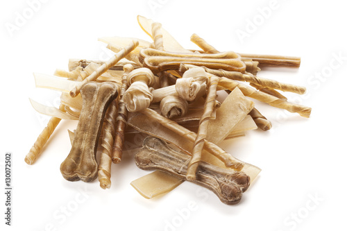 Rawhide dog chewing bones assortment photo