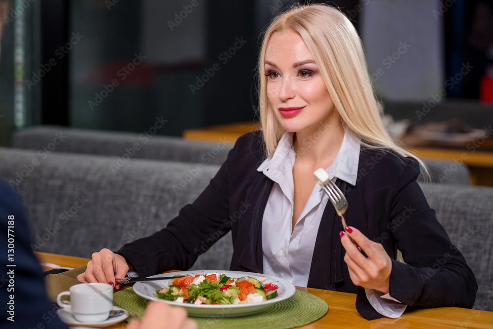 woman and man on business lunch woman and man on business lunch