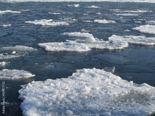 A freezing sea is covered with ice floes