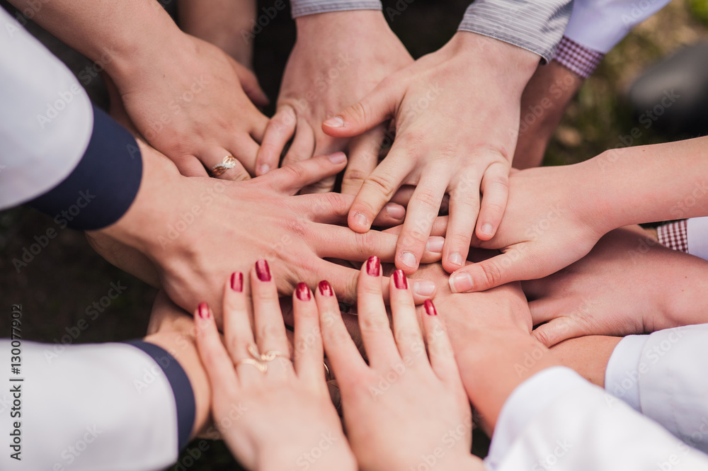 Hands of young people in the nature Hands of young people in the nature