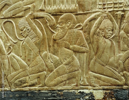 Detail from a state chariot showing the vanquished and enslaved enemies of Egypt, from the tomb of the pharaoh Tutankhamun, discovered in the Valley of the Kings, Thebes, Egypt
