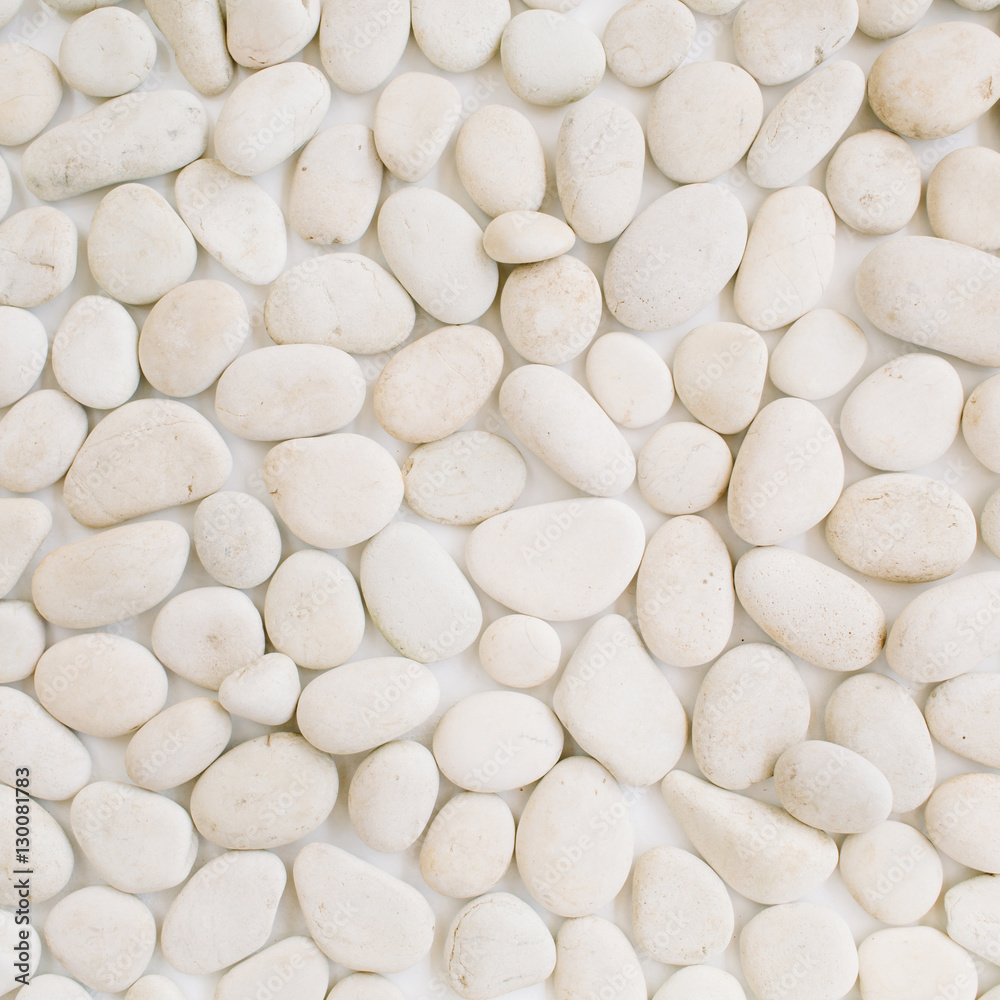 Neutral pattern of beige stones. Flat lay, top view Neutral pattern of beige stones. Flat lay, top view